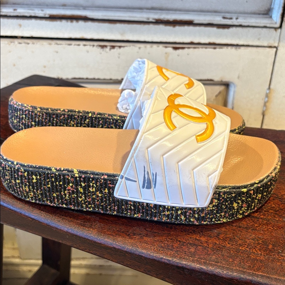 Sandals Feature A Large Gold Interlocking Large L… - image 6